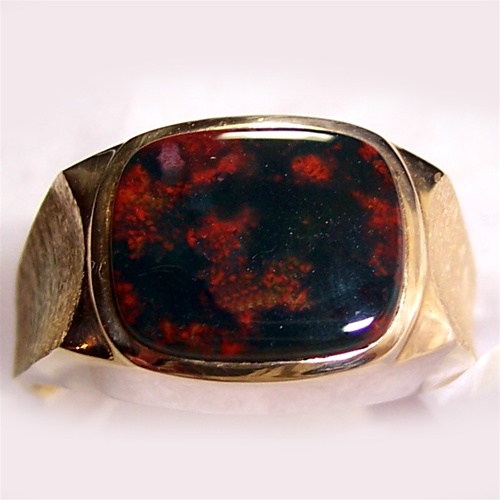 A bloodstone ring with a gold setting