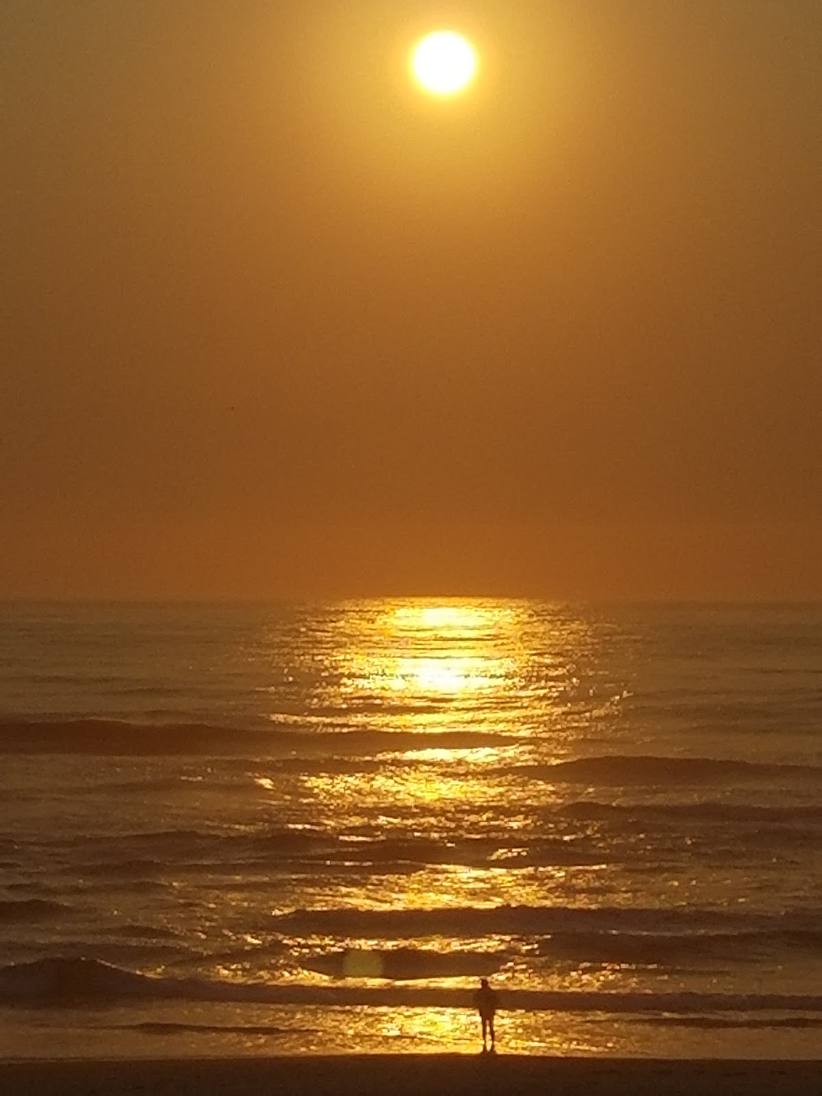 Sunrise by the seashore